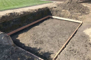 Placement of forms for wall foundation and concrete slab
