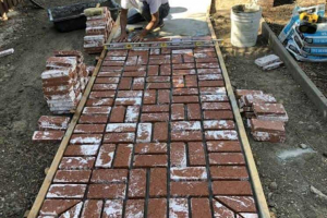 Brick paver install on new walkway
