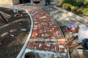 Brick paver install at new adjoining walkway