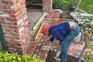 Grout install at patio bullnose bricks