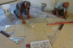 Floor tile installation at new living room
