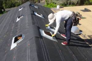 Dormer vent base flashings being installed - incorporated correctly into roofing felt paper
