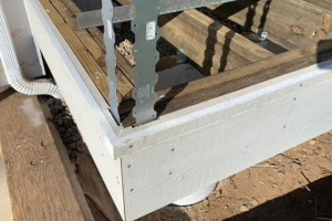 Balcony outboard subfloor corner prior to edge metal flashing install