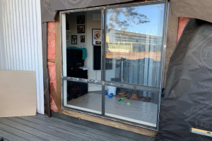 Siding removed at patio door’s location