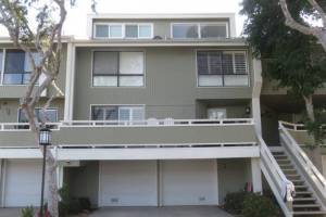 Four level Newport Beach town home with wood decay @ garage headers
